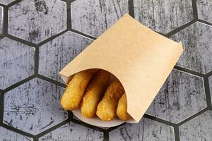 Breaded cheese sticks snack appetizer photo