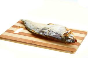 Dried fish isolated on white photo