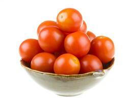 Cherry tomatoes isolated on white photo