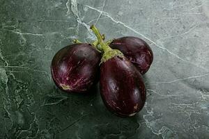 Raw smal asian baby eggplant photo