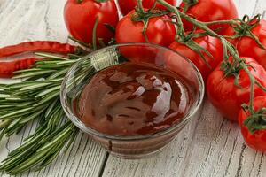 Tomato barbecue sauce on the bowl photo