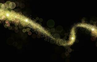 Luxury gold glitter. golden sparkle confetti. shiny glittering dust photo
