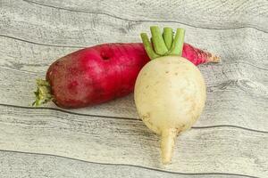 Fresh vegetable - daikon for vegan cuisine photo