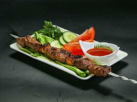 Grilled beef barbecue served vegetables photo