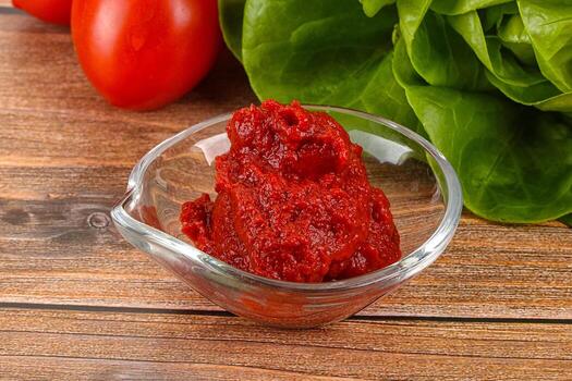 Tomato puree sauce for cooking photo