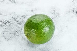 Natural irganic sour ripe lime photo