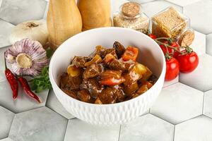 Homemade beef hungarian goulash with potato photo