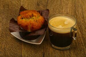 Muffin with espresso photo