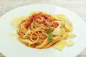 Italian pasta Spaghetti bolognese with parmesan photo