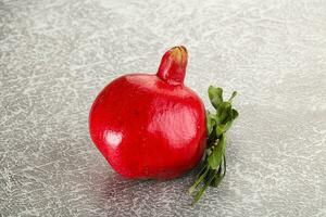 Ripe red sweet and juicy Pomegranate photo