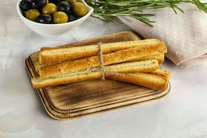 Crispy grissini italian bread heap photo