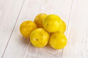 Yellow sweet plum heap fruit photo