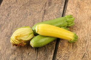 Raw baby organic zucchini heap photo