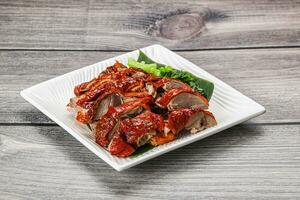 Asian cuisine - roasted duck with skin photo