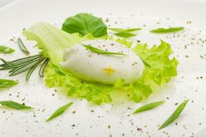 poached egg with green onion photo