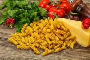 Italian pasta - raw Girandole for cooking photo