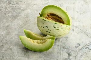 Ripe sweet and juicy dalmatian melon photo