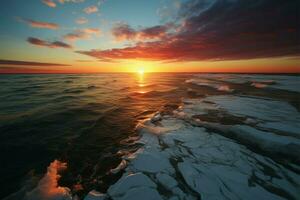 puesta de sol por el playa, enmarcado por majestuoso montañas en el horizonte ai generado foto