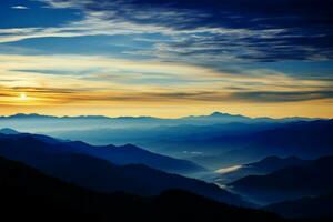 Natures canvas mountains turn a breathtaking shade of twilight blue AI Generated photo