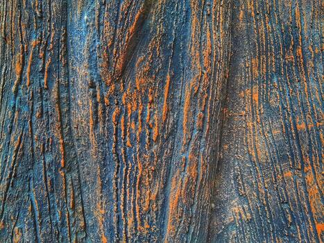 Closeup of tree trunk. Concrete wood texture. Tree bark texture of the cement relief plaster wall with natural color paint. photo