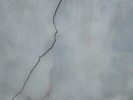 Concrete wall textured of rough and cracked. Grunge background with copy space photo