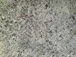 Grainy textured concrete wall for pattern and background photo