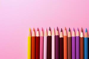 Colored pencils pop against the pink backdrop, leaving ample copy space AI Generated photo