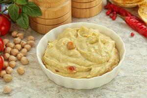 Natural organic chickpea hummus with olive oil photo
