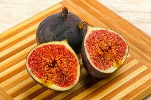 Figs over wooden background photo