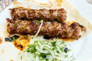 portion of kebabs close up in Armenian village photo