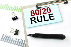 Paper plate, marker, diagram, chart and office tools. Text 80 and 20 rule photo