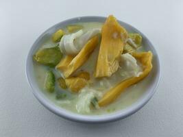 Traditional Indonesian dessert made from jackfruit, coconut, avocado, milk and sugar. In Indonesia it is called es teler photo