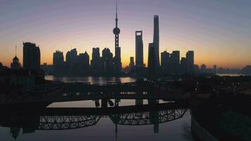 Panoramic Shanghai Skyline at Dawn. Lujiazui Financial District and Huangpu River. China. Aerial View. Drone is Flying Upward. Establishing Shot video