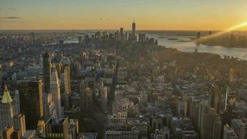 Cityscape of Manhattan, New York at Sunset. United States of America. Aerial View. Day to Night Time Lapse video