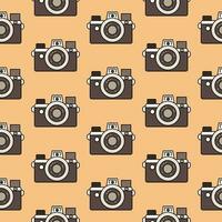 Cute seamless pattern vintage camera in retro colors, isolated on a beige background. Background, backdrop, wrapping paper. vector