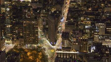 Cityscape of Manhattan with Flatiron Building at Night. New York City, United States of America. Aerial View. Time Lapse video