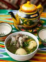 Surpa Soup from Boiled beef, potatoes and onions according to an oriental recipe. Eastern cuisine, national dish photo