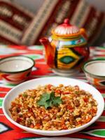 An oriental dish lagman homemade noodles fried with meat and vegetables. Eastern cuisine photo