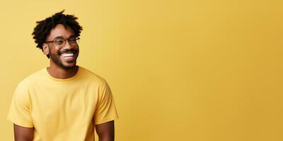 ai generative Attractive man wearing yellow tshirt and glasses. Isolated on yellow background. photo