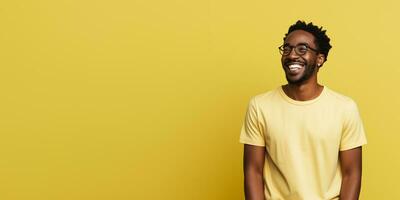 ai generative Attractive man wearing yellow tshirt and glasses. Isolated on yellow background. photo