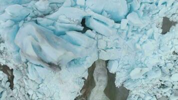 Blue Nigardsbreen Glacier is Part of Jostedalsbreen Glacier - the Largest in Europe. Norway. Ice Blocks. Aerial Close-Up Vertical Top-Down View video