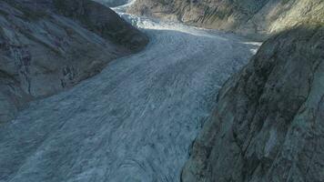 Nigardsbreen Glacier is Arm of Jostedalsbreen in Norway. The Largest Glacier in Europe. Aerial Reveal Shot. Drone is Flying Forward, Camera is Tilting Up. video