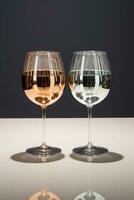 Mirror image distortions using wine glasses and reflective surfaces captured in a palette of metallic silver mirror white and infinity black photo