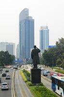 View of the city of Jakarta from a height, General Sudirman statue, photo