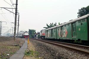 Commuter Line or electric train in Jakarta, Indonesia photo