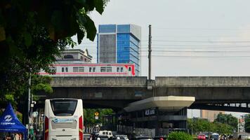 Commuter Line or electric train in Jakarta, Indonesia photo