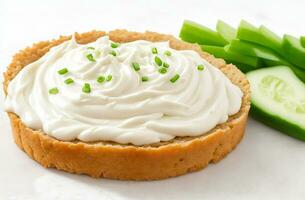 Benedictine spread Cream cheese with cucumber and spring onions on white background photo