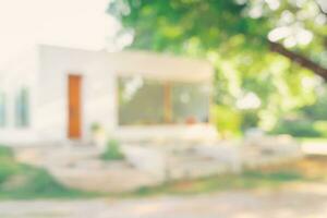 Defocused or blur with bokeh background of garden trees in sunny day photo