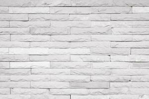 Detail of a white brick wall texture and background with copy space photo