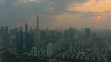 Skyline of Shenzhen City at Sunset. Futian District. China. Aerial View. Drone Flies Forward and Upwards video